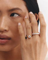 Model wears the Meroë Round Solitaire with a Laboratory Grown Diamond.