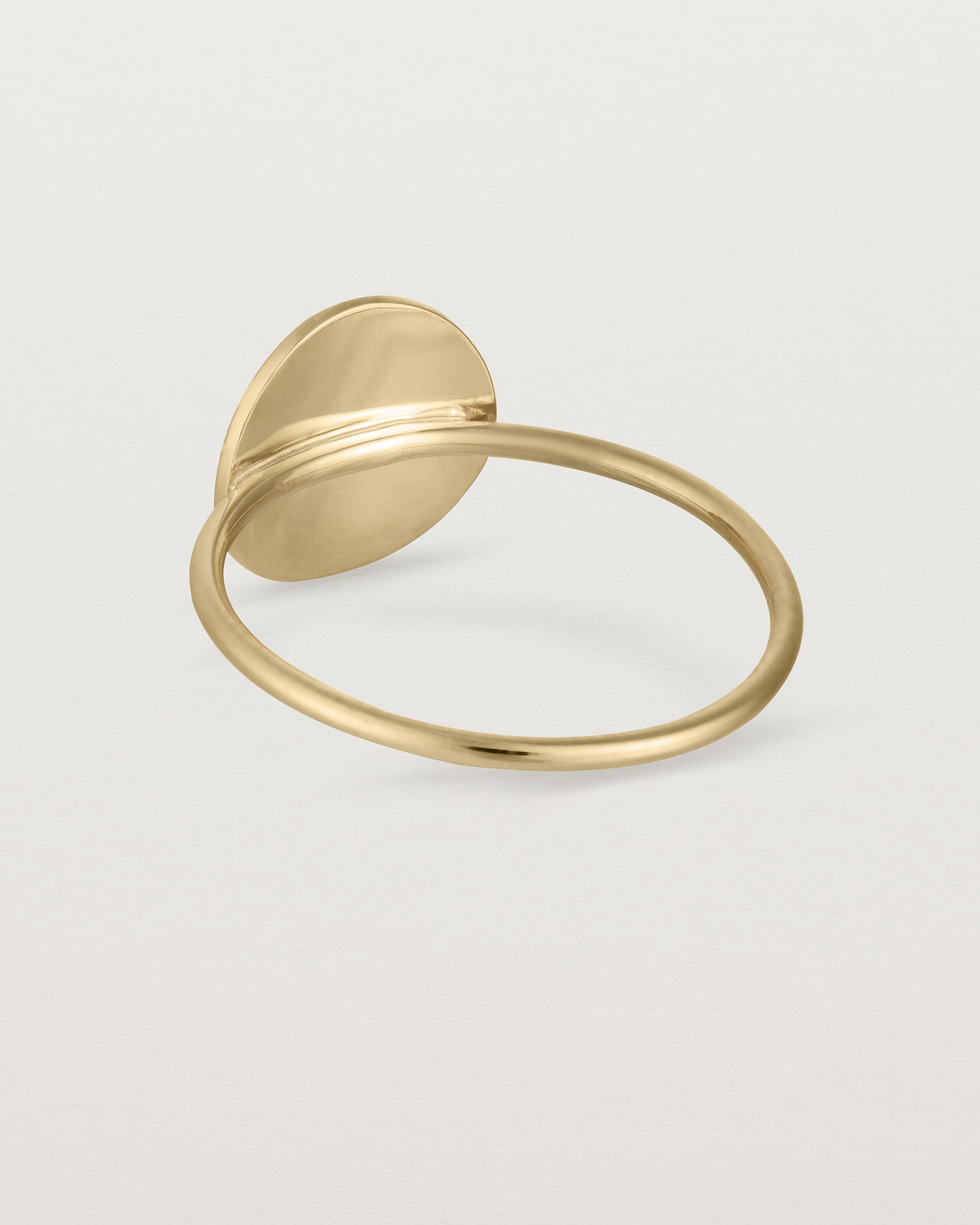 Back view of the Mini Initial Ring in Yellow Gold.