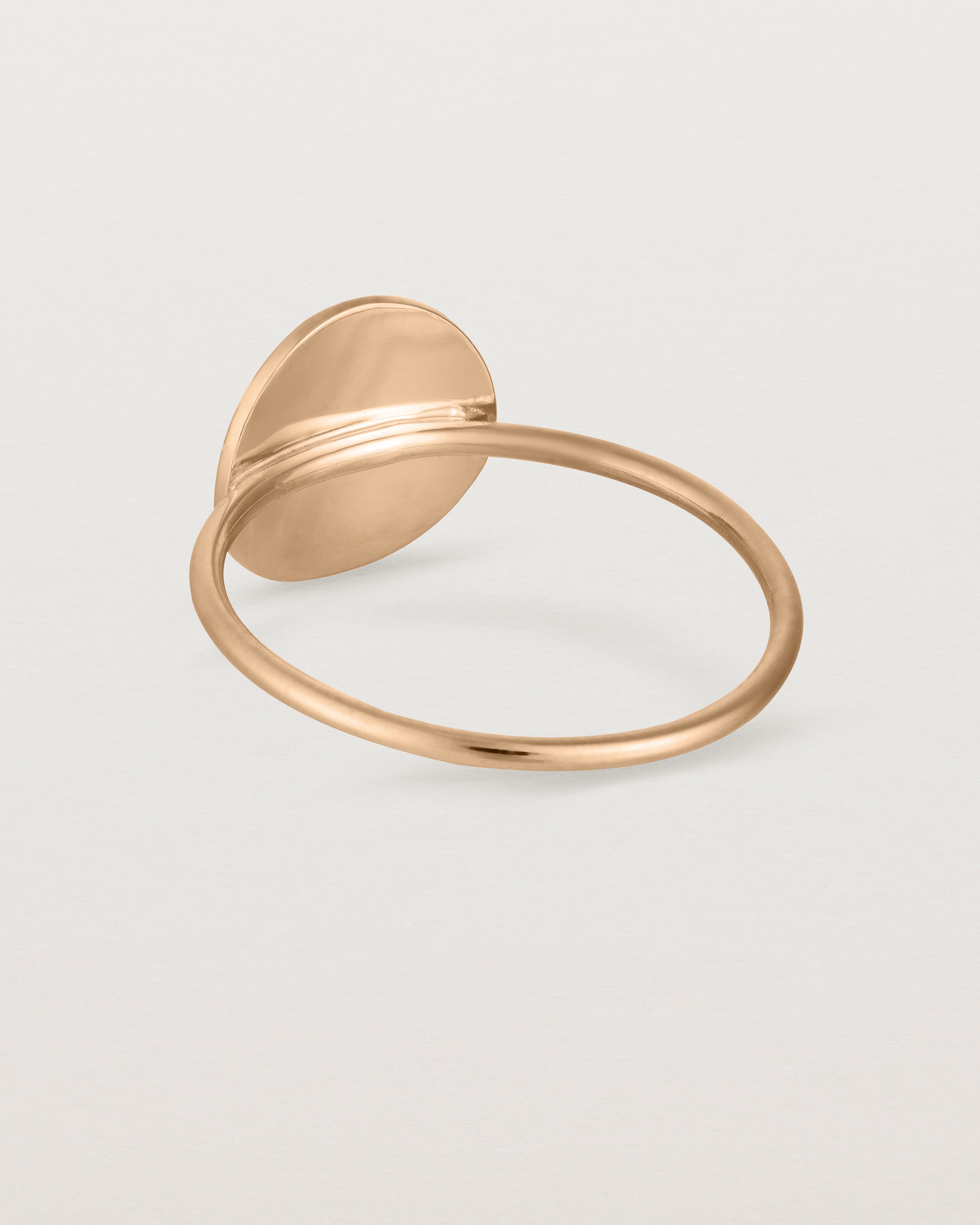 Back view of the Mini Initial Ring in Rose Gold.