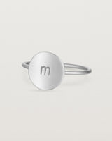 Angled view of the Mini Initial Ring in Sterling Silver.