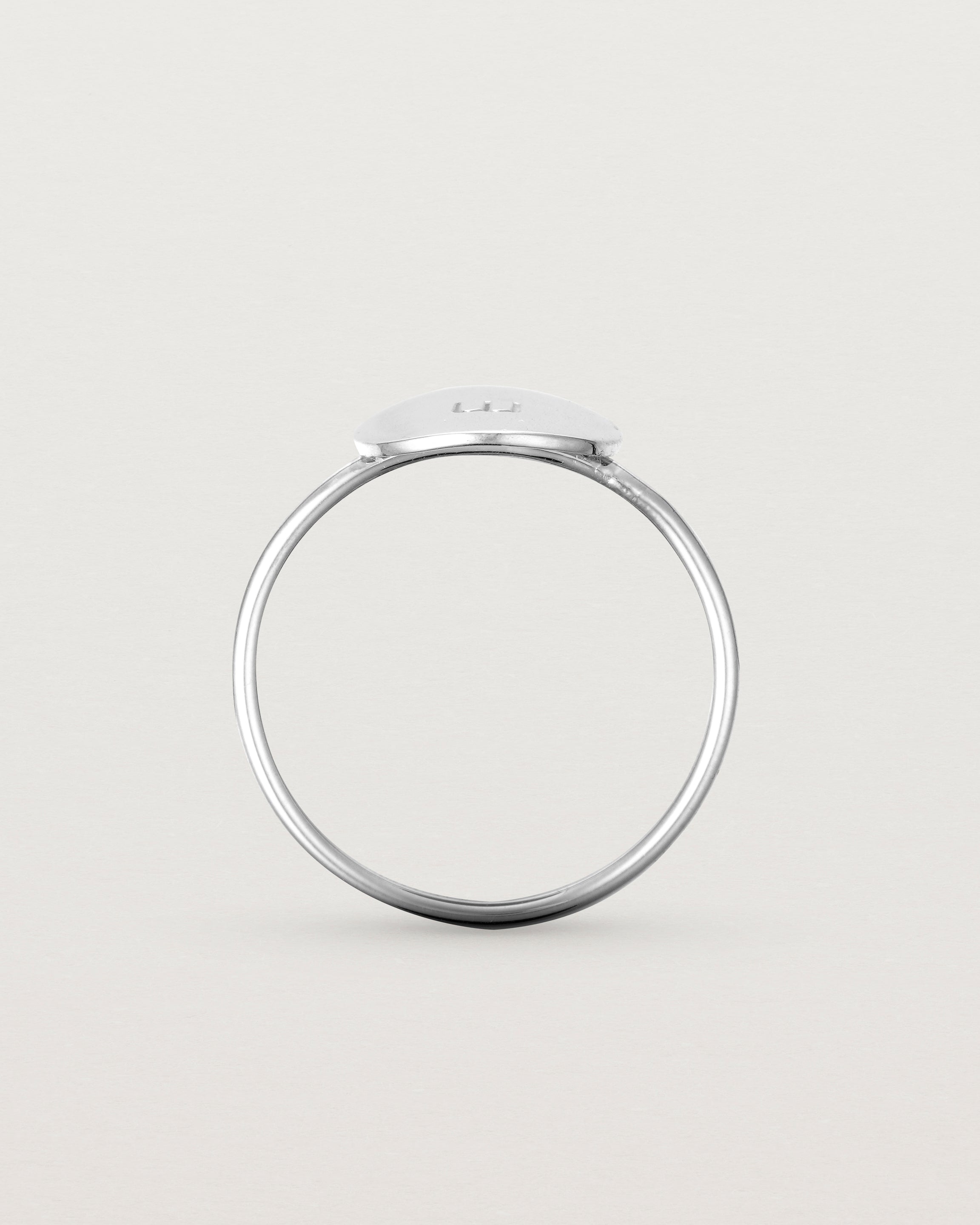 Standing view of the Mini Initial Ring in Sterling Silver.