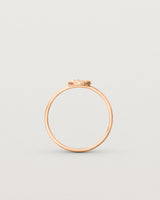 Standing view of the Moon Ring in rose gold.