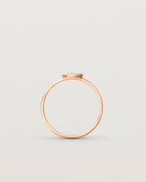 Standing view of the Moon Ring in rose gold.