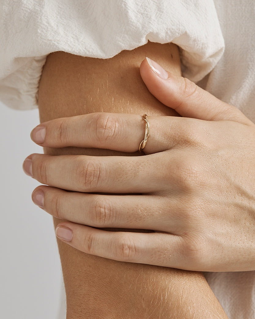 A model wearing the Petite Dali Ring in Yellow Gold.