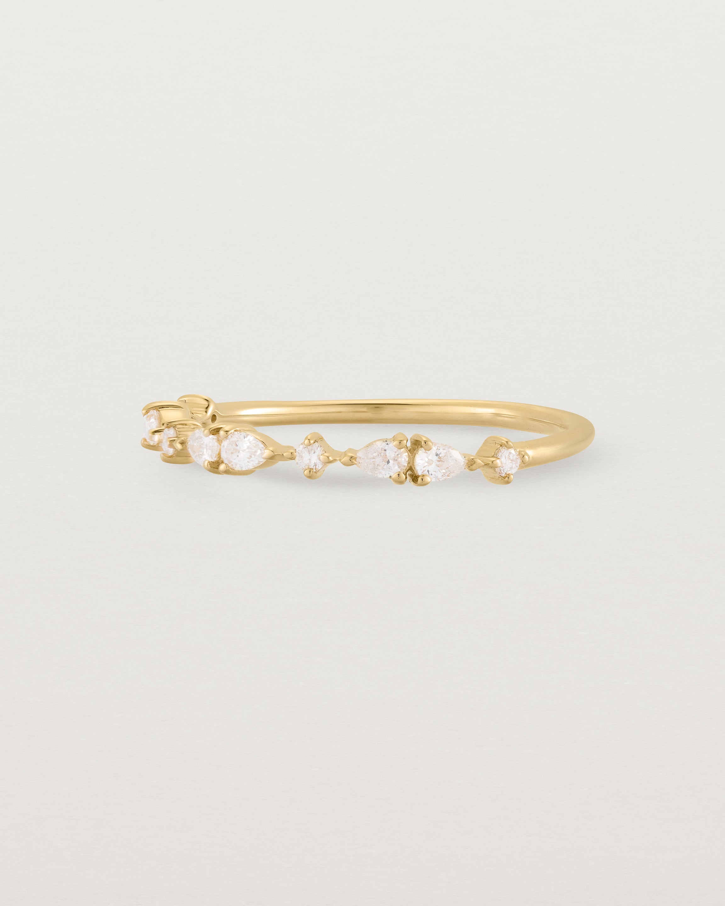 Angled view of the Neai Ring | Diamonds in Yellow Gold.