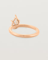 Back view of a 1.20ct pear cut diamond set in our Signature Solitaire setting crafted in rose gold