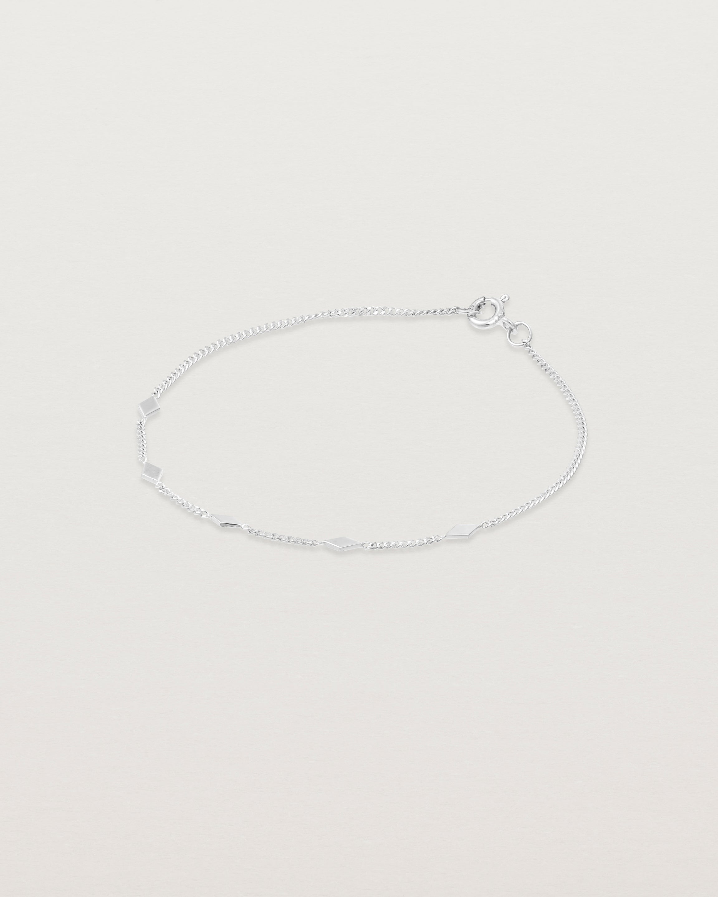 Top down view of the Nuna Charm Bracelet in Sterling Silver.