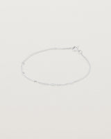 Top down view of the Nuna Charm Bracelet in Sterling Silver.