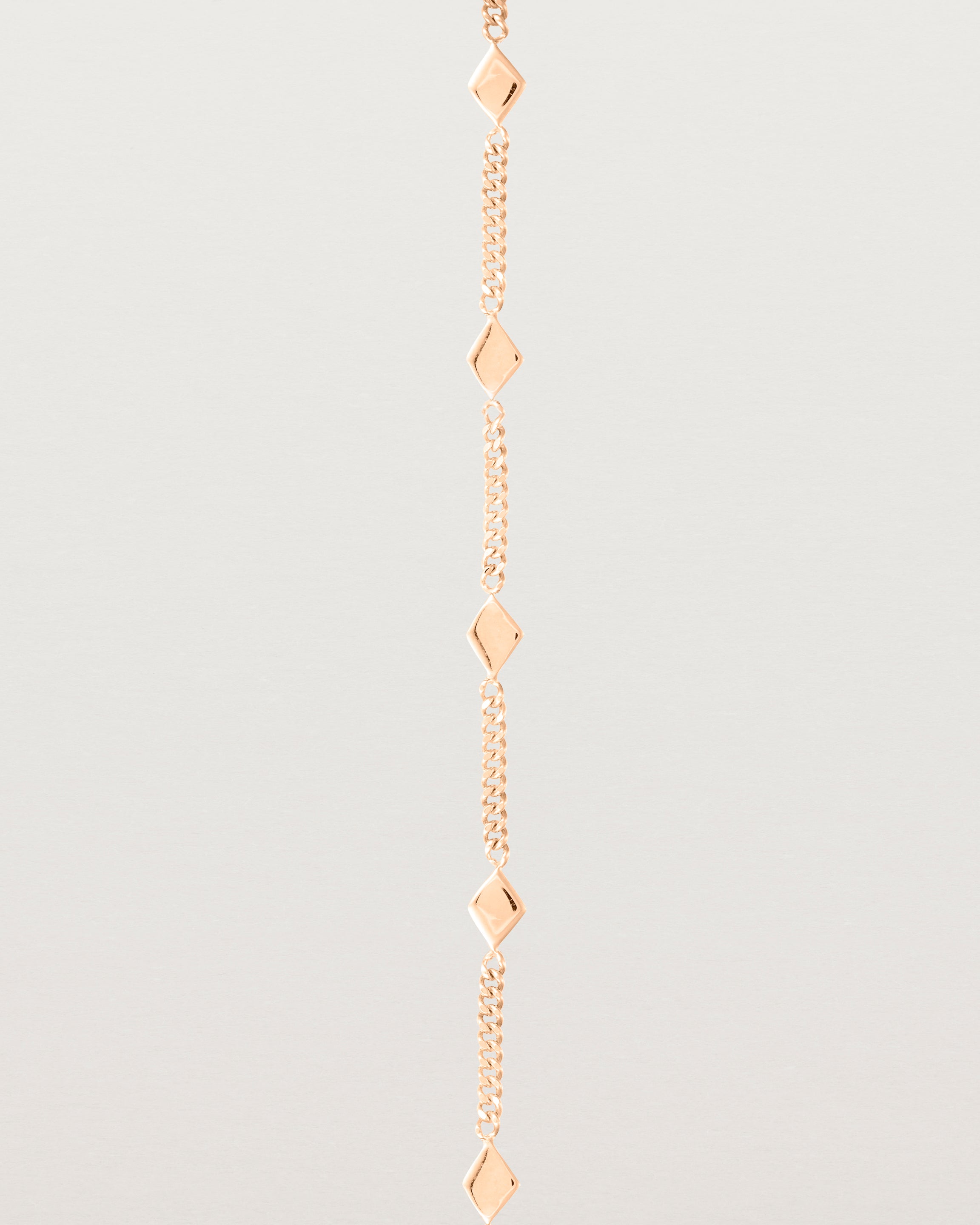 Close up of the Nuna Charm Bracelet in Rose Gold.