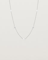 Front view of the Nuna Charm Necklace in sterling silver.