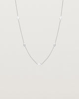 Front view of the Nuna Charm Necklace in sterling silver.