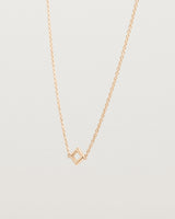 Angled view of the Nuna Necklace | Rose Gold.