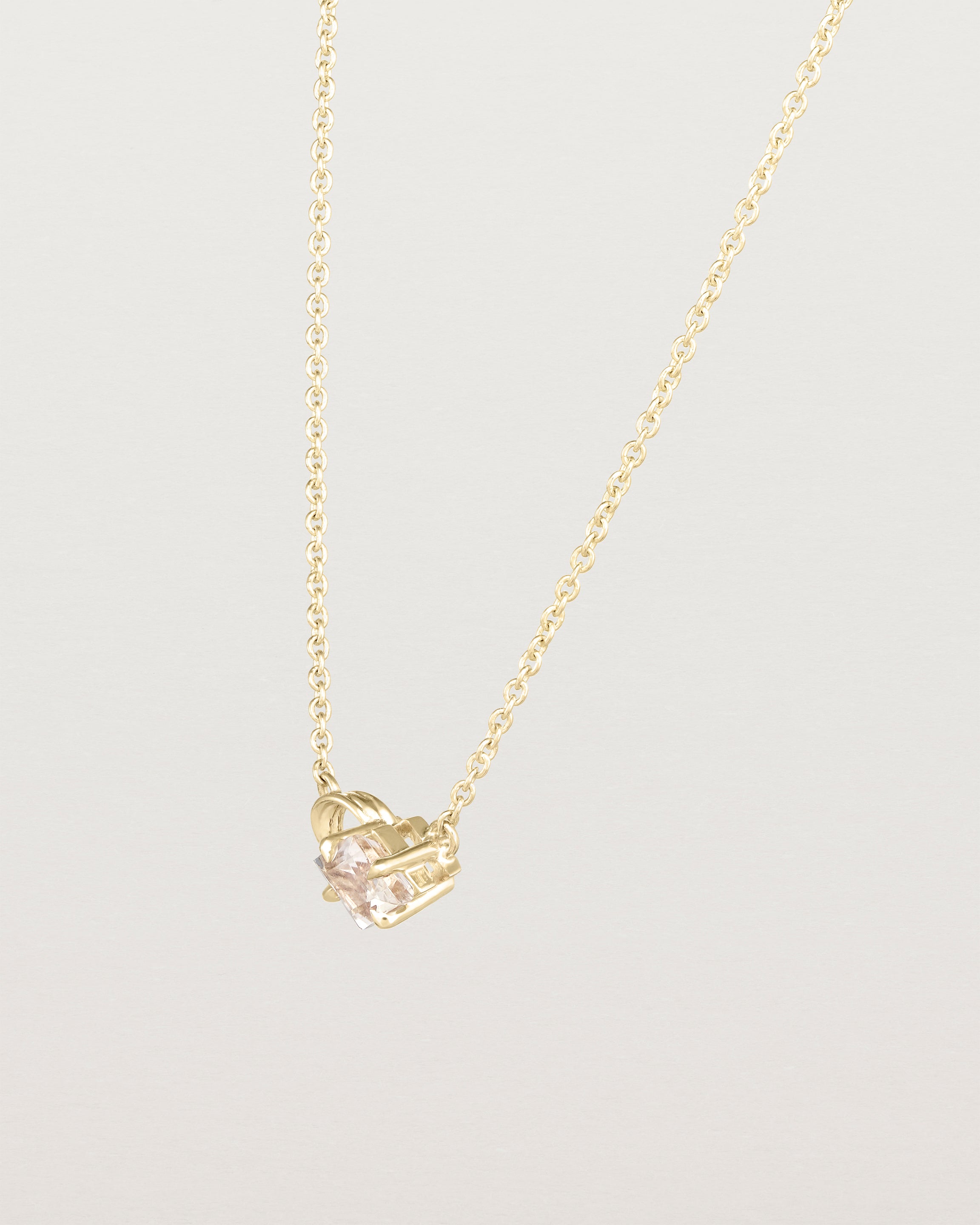 Angled view of the Nuna Necklace | Savannah Sunstone in yellow gold.