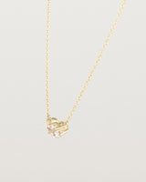 Angled view of the Nuna Necklace | Savannah Sunstone in yellow gold.