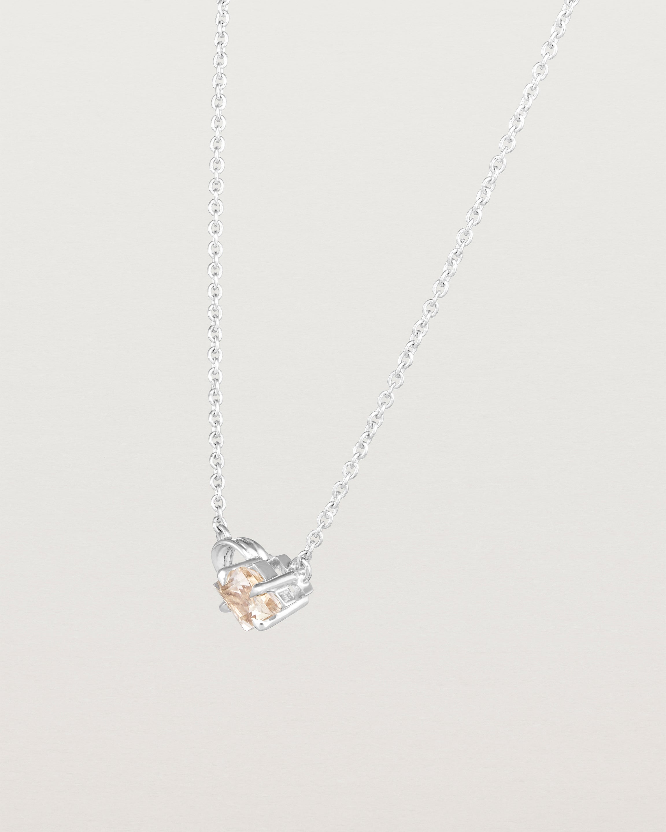 Angled view of the Nuna Necklace | Savannah Sunstone in sterling silver.