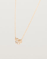 Angled view of the Nuna Necklace | Savannah Sunstone in rose gold.