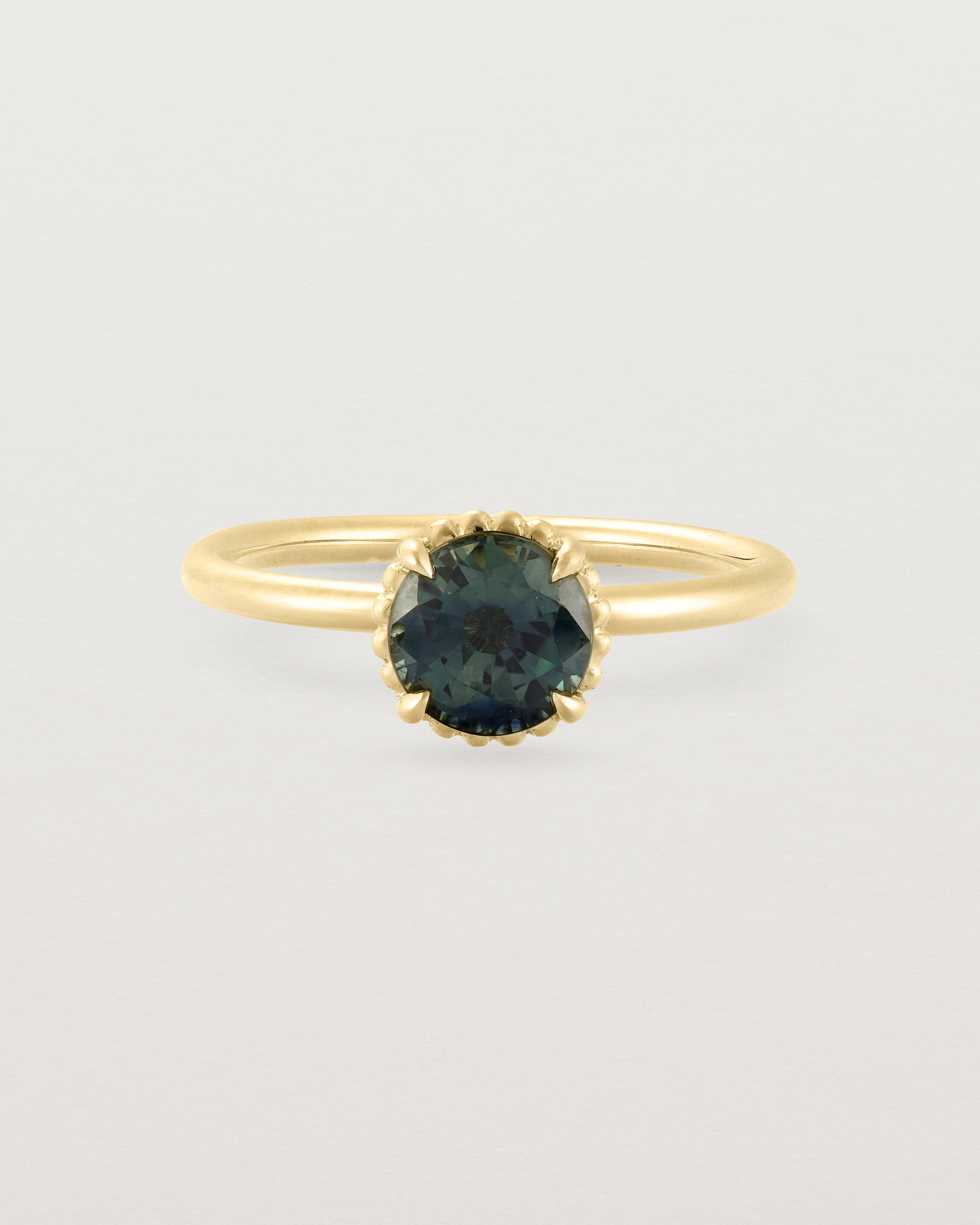 Front view of the Celia | Round Tulip Solitaire | Teal Sapphire.