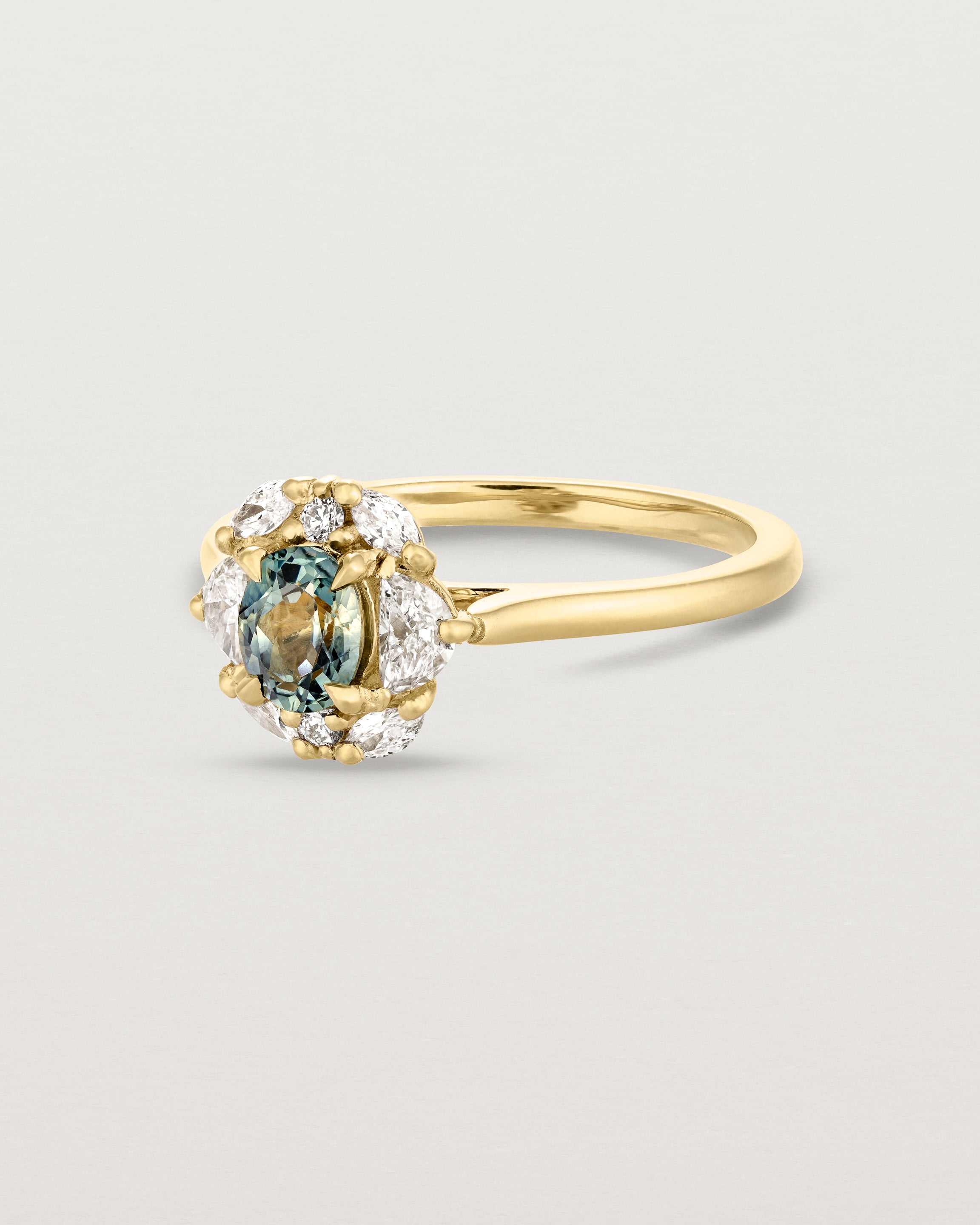 Angled view of the Mathilde Vintage Halo Ring | Sapphire & Diamonds.