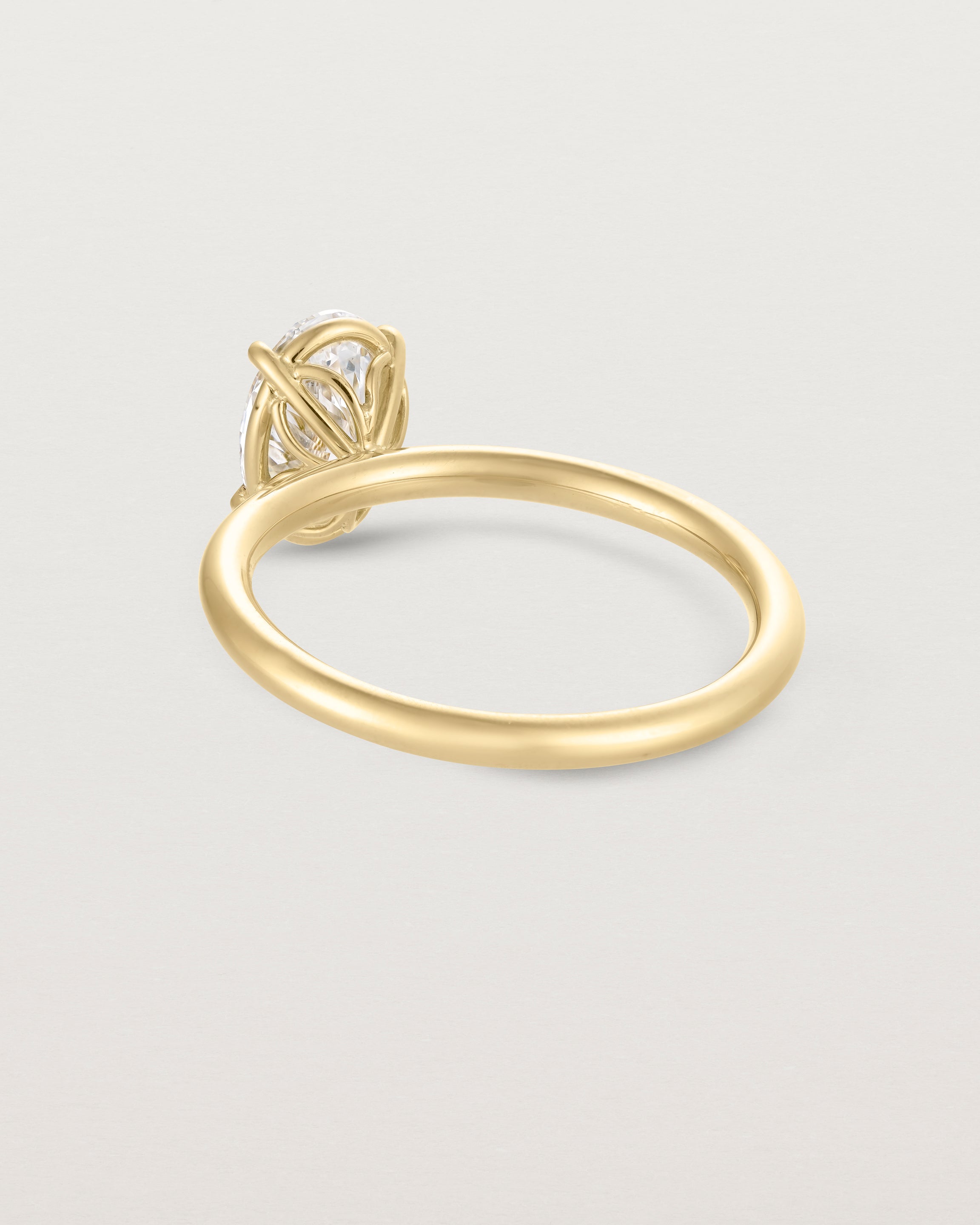 Back view of the No. 112 Signature Solitaire | Laboratory Grown Diamond in yellow gold.