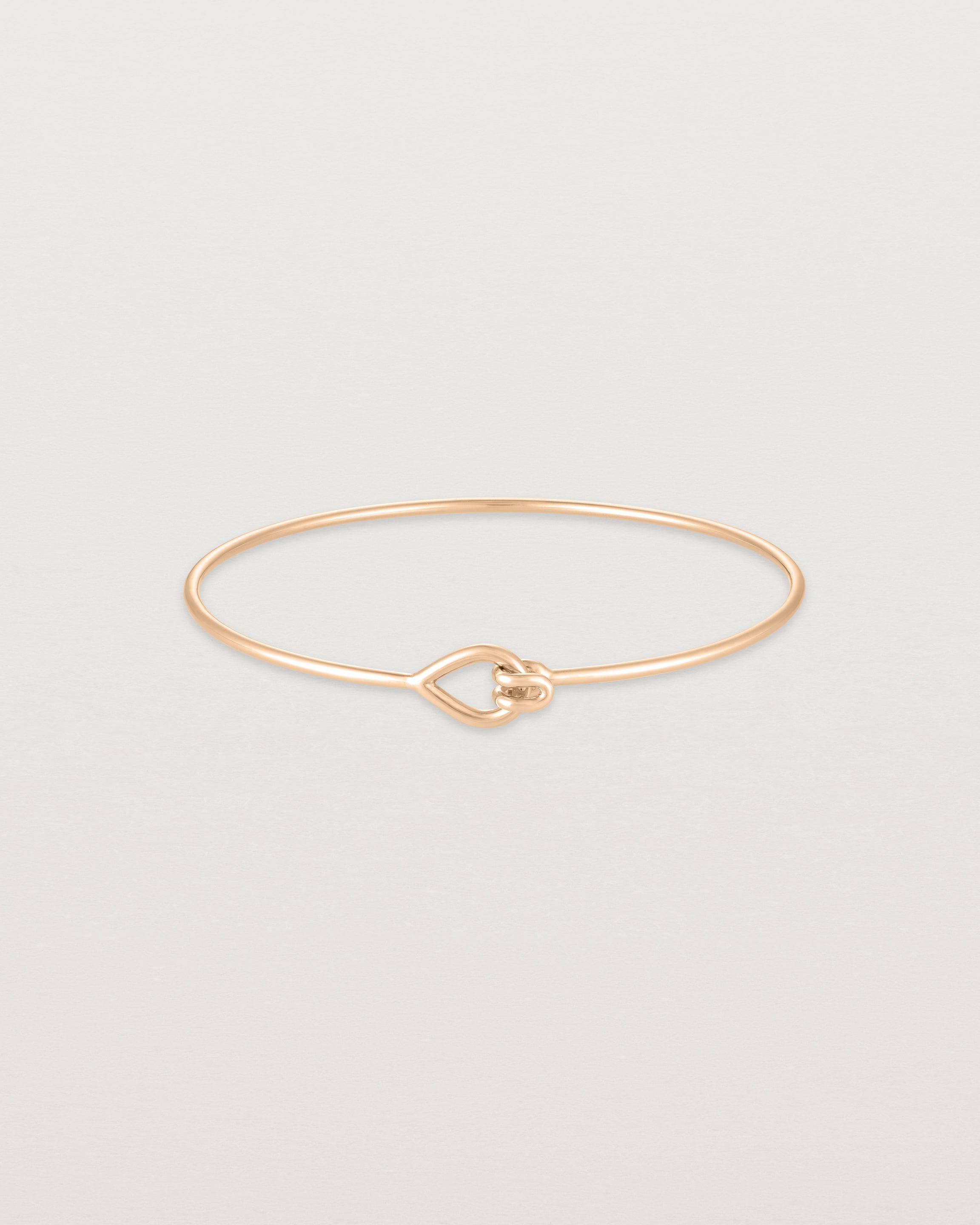 Front view of the Oana Bangle in rose gold.