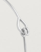Close up view of the Oana Bangle in sterling silver.