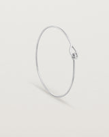 Standing view of the Oana Bangle in sterling silver.