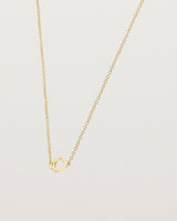 Angled view of  the Oana Necklace in Yellow Gold.