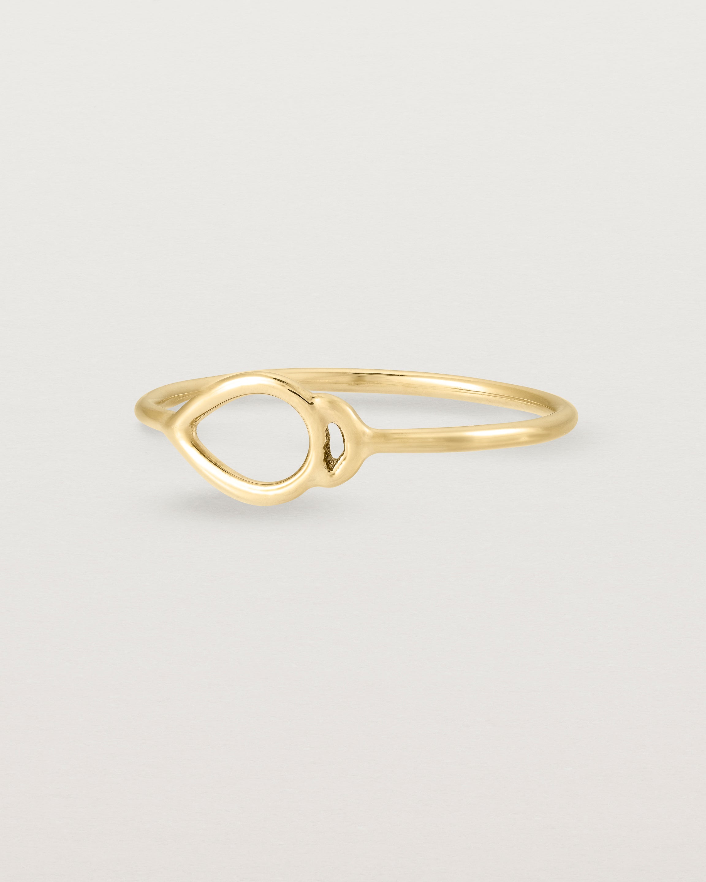 Angled view of the Oana Ring in Yellow Gold.