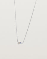 Angled view of the Ode Necklace | Diamond & Sapphire | White Gold