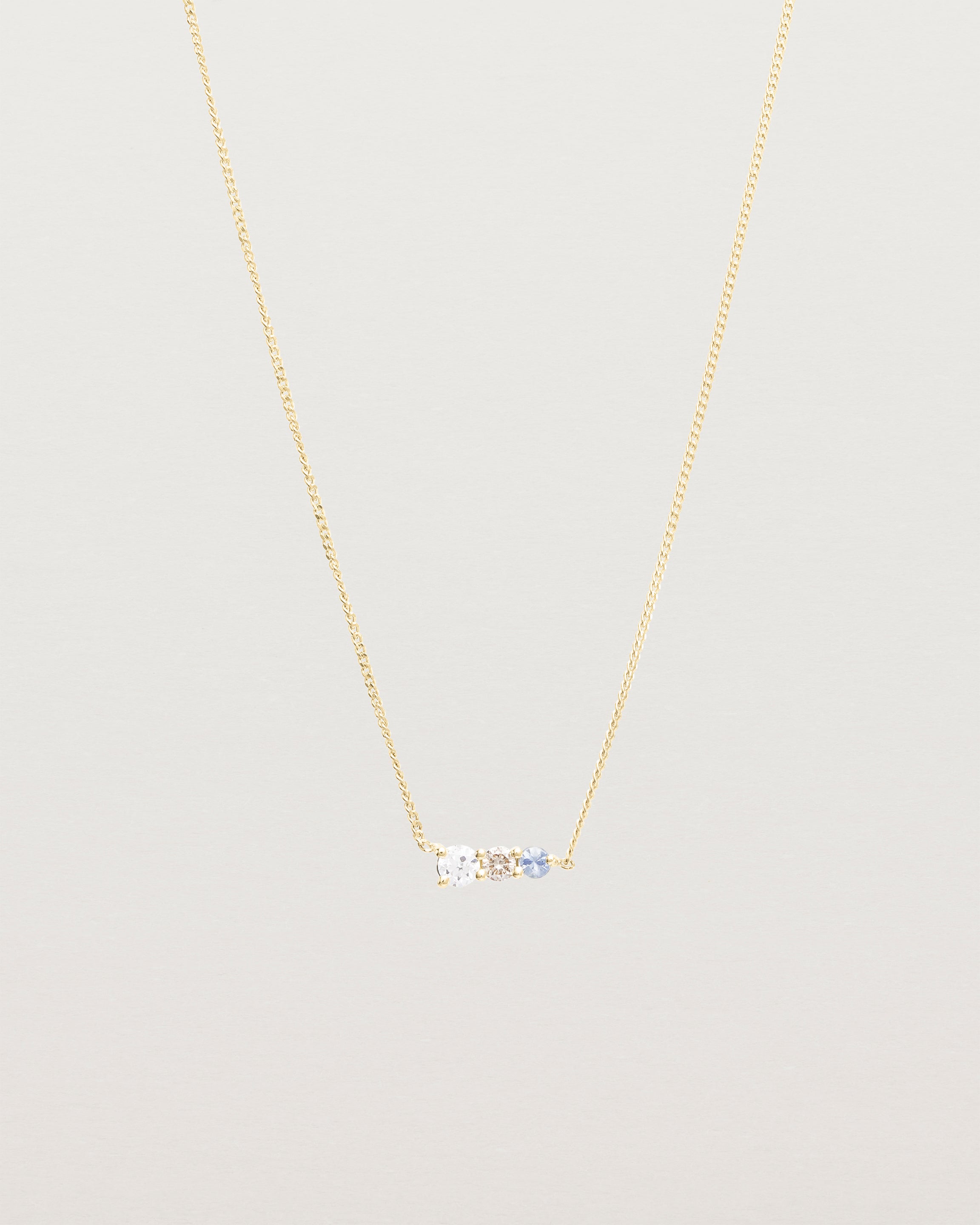 Front view of the Ode Necklace | Diamond & Sapphire | Yellow Gold