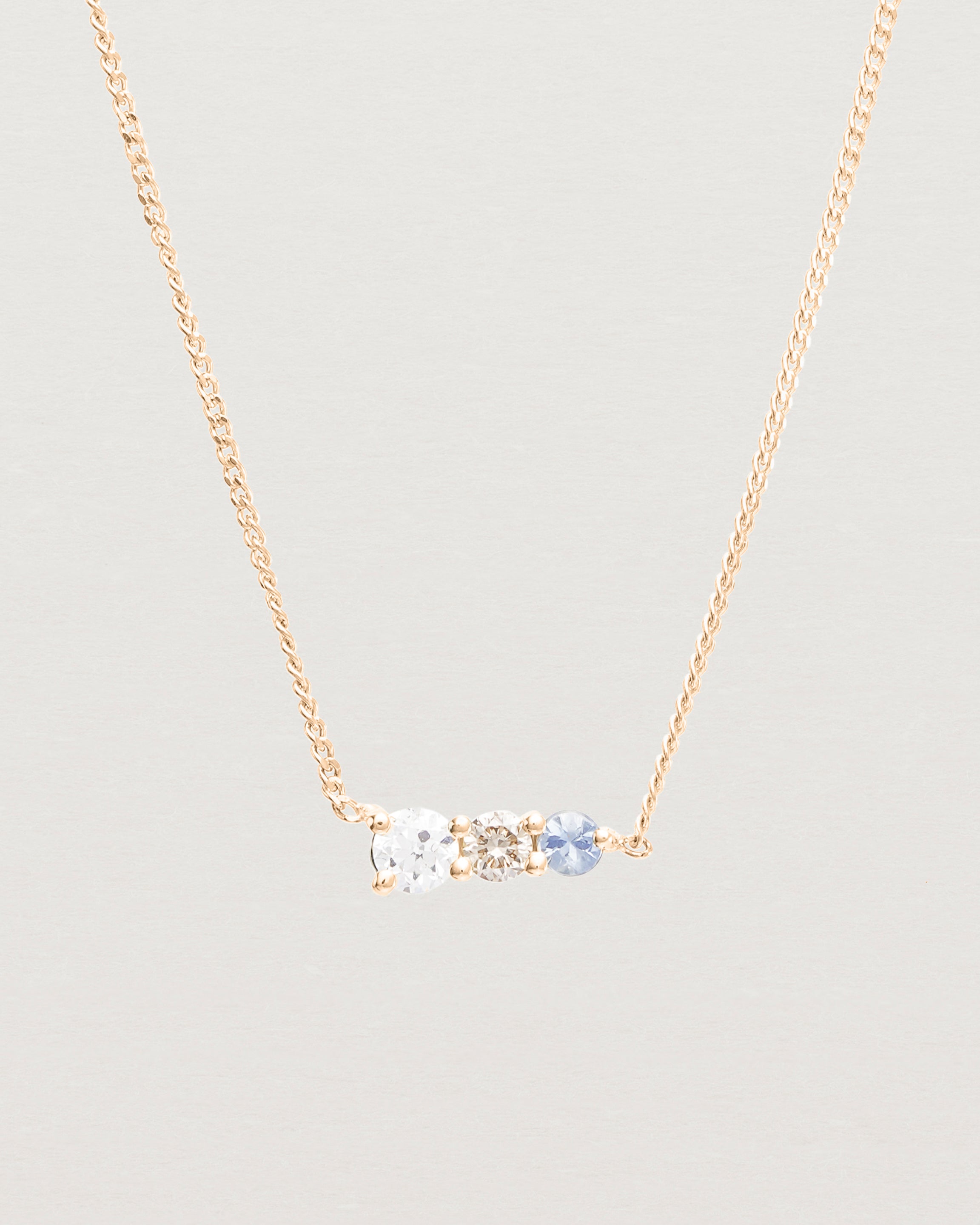 Close up view of the Ode Necklace | Diamond & Sapphire | Rose Gold