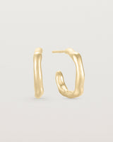 A pair of Organic Hoops | Yellow Gold.