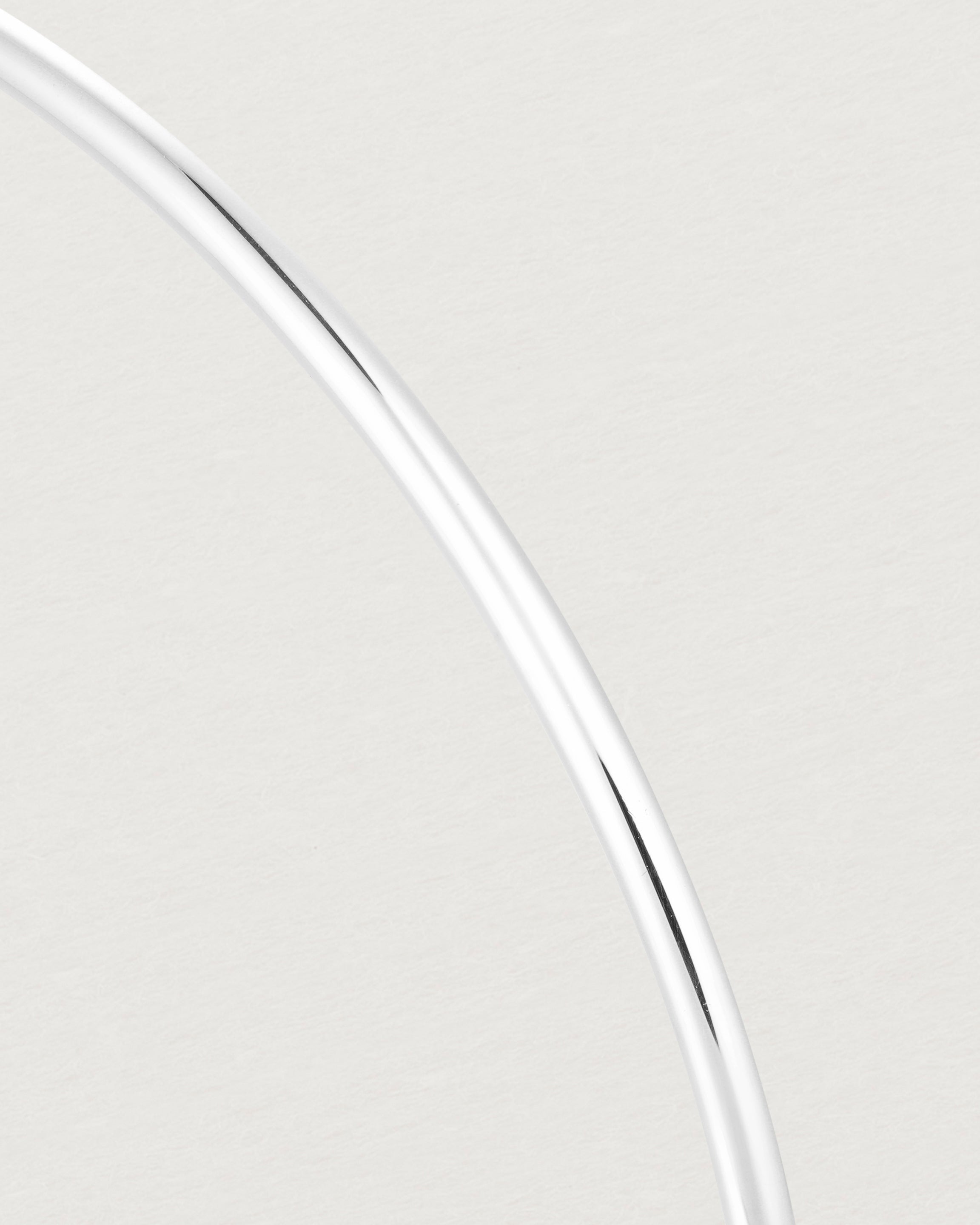 Close up of the detail of the Oval Bangle in Sterling Silver.