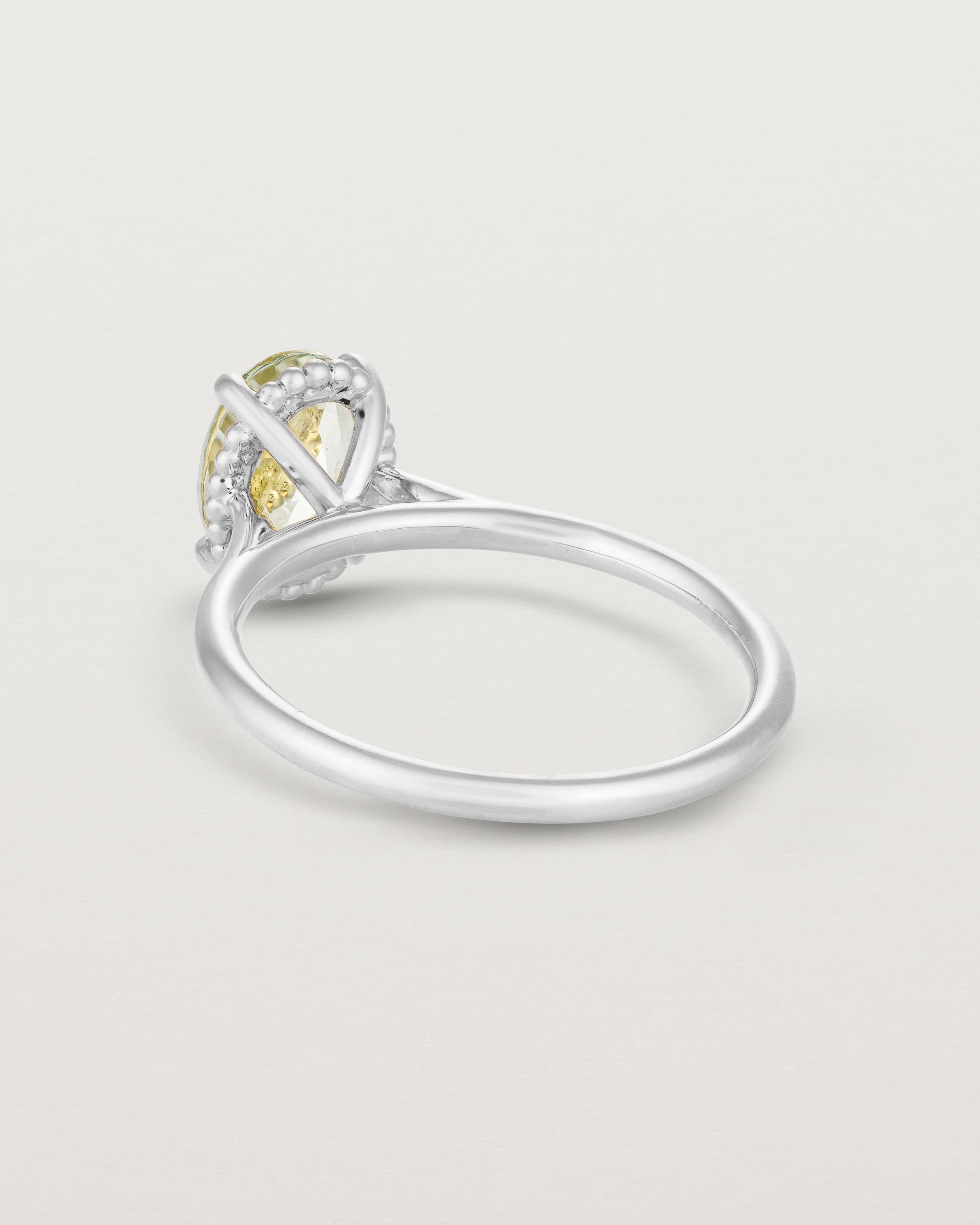 Back view of the Thea Oval Solitaire | Green Amethyst in white gold.