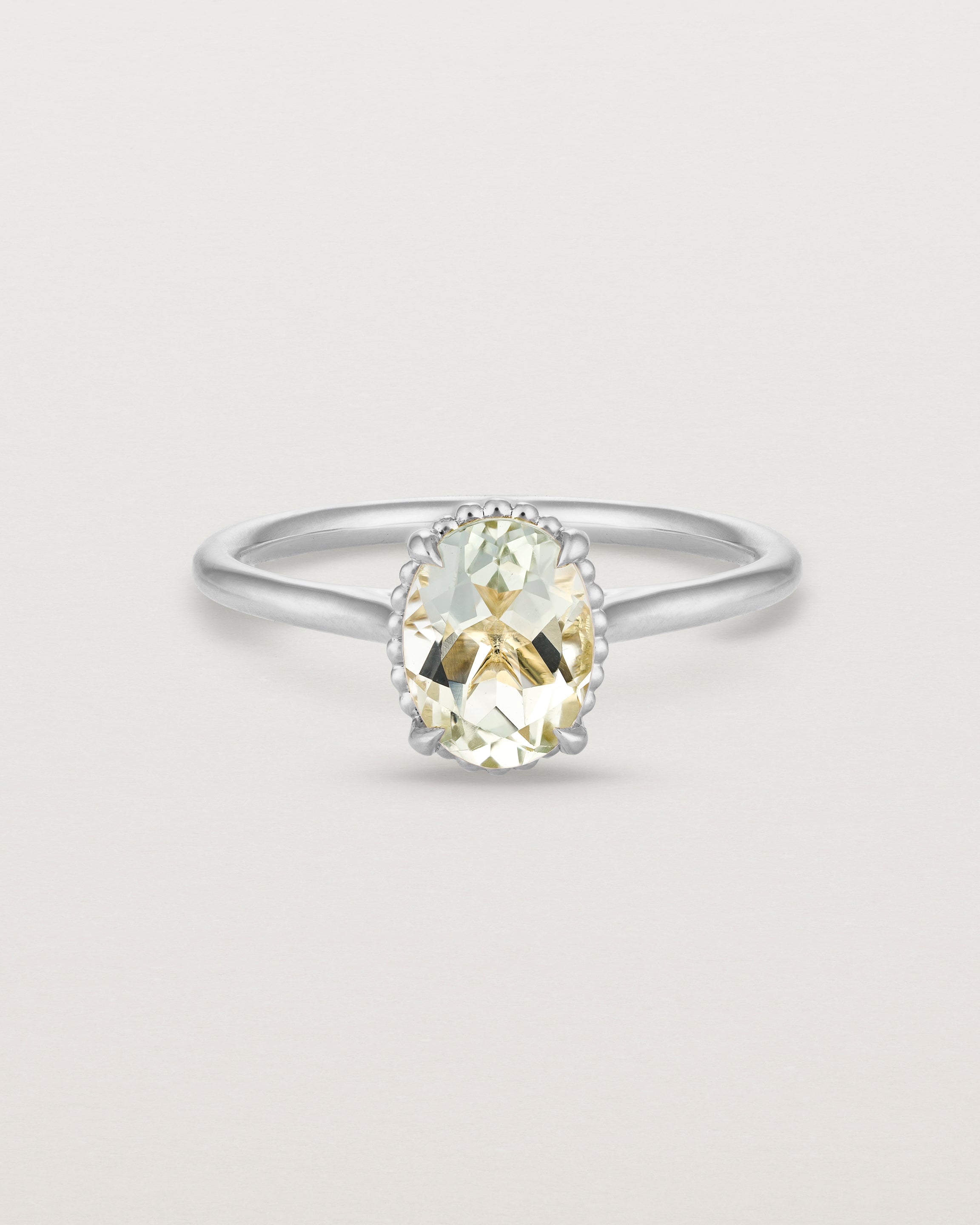 Front view of the Thea Oval Solitaire | Green Amethyst in white gold.