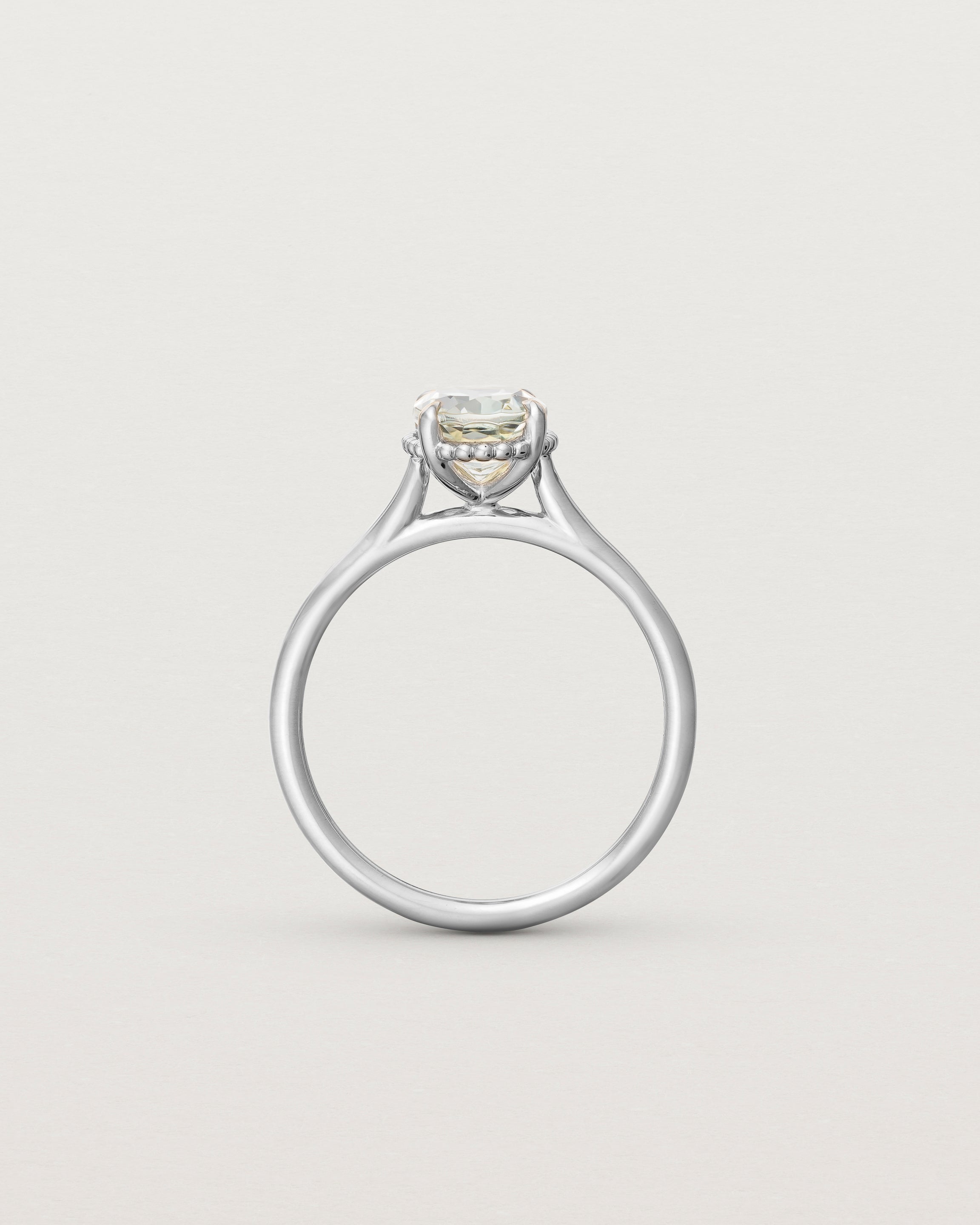Standing view of the Thea Oval Solitaire | Green Amethyst in white gold.