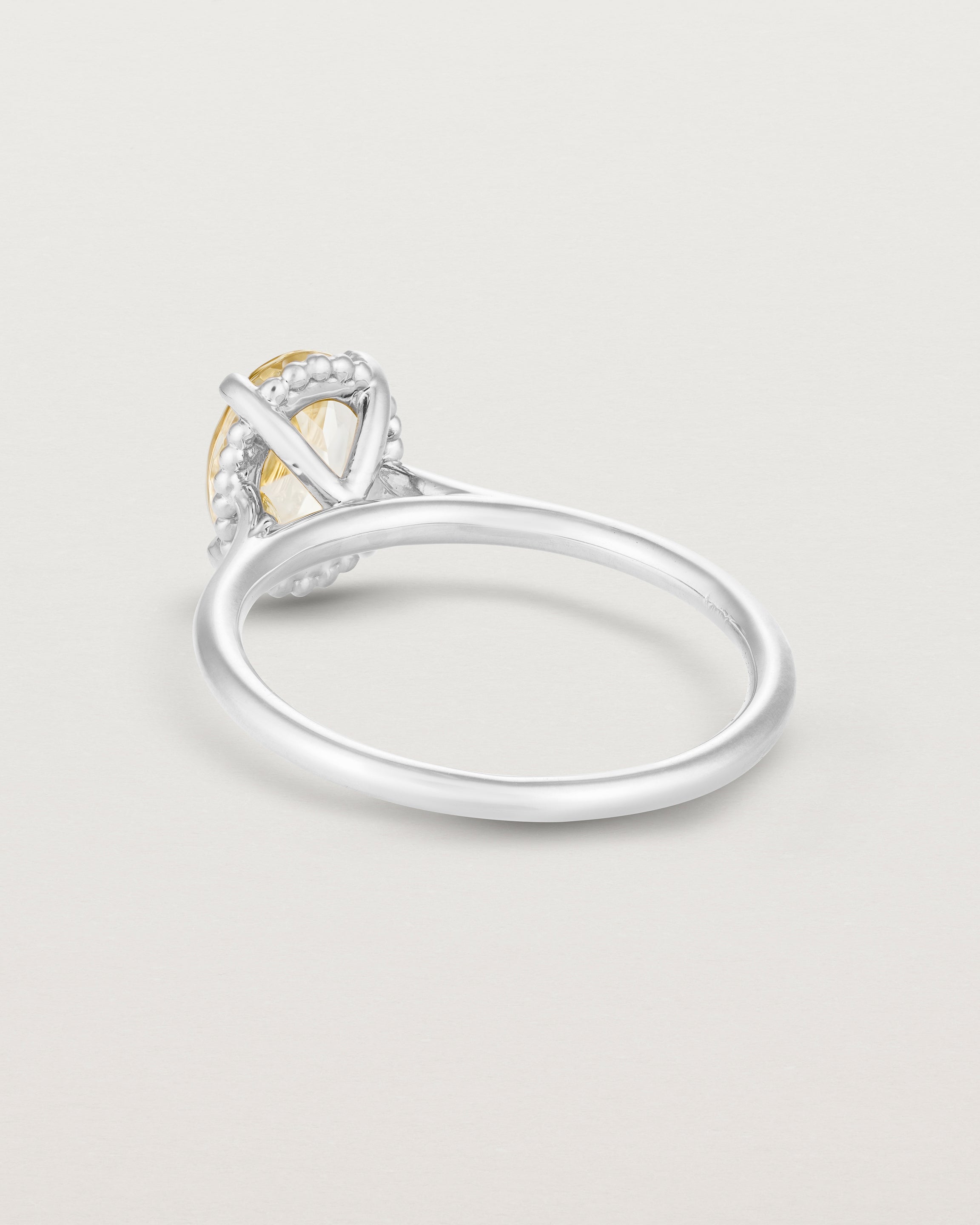 Back view of the Thea Oval Solitaire | Savannah Sunstone in white gold.