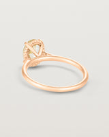 Back view of the Thea Oval Solitaire | Savannah Sunstone in rose gold.