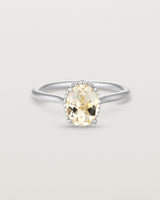Front view of the Thea Oval Solitaire | Savannah Sunstone in white gold.