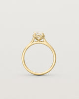 Standing view of the Thea Oval Solitaire | Savannah Sunstone in yellow gold.