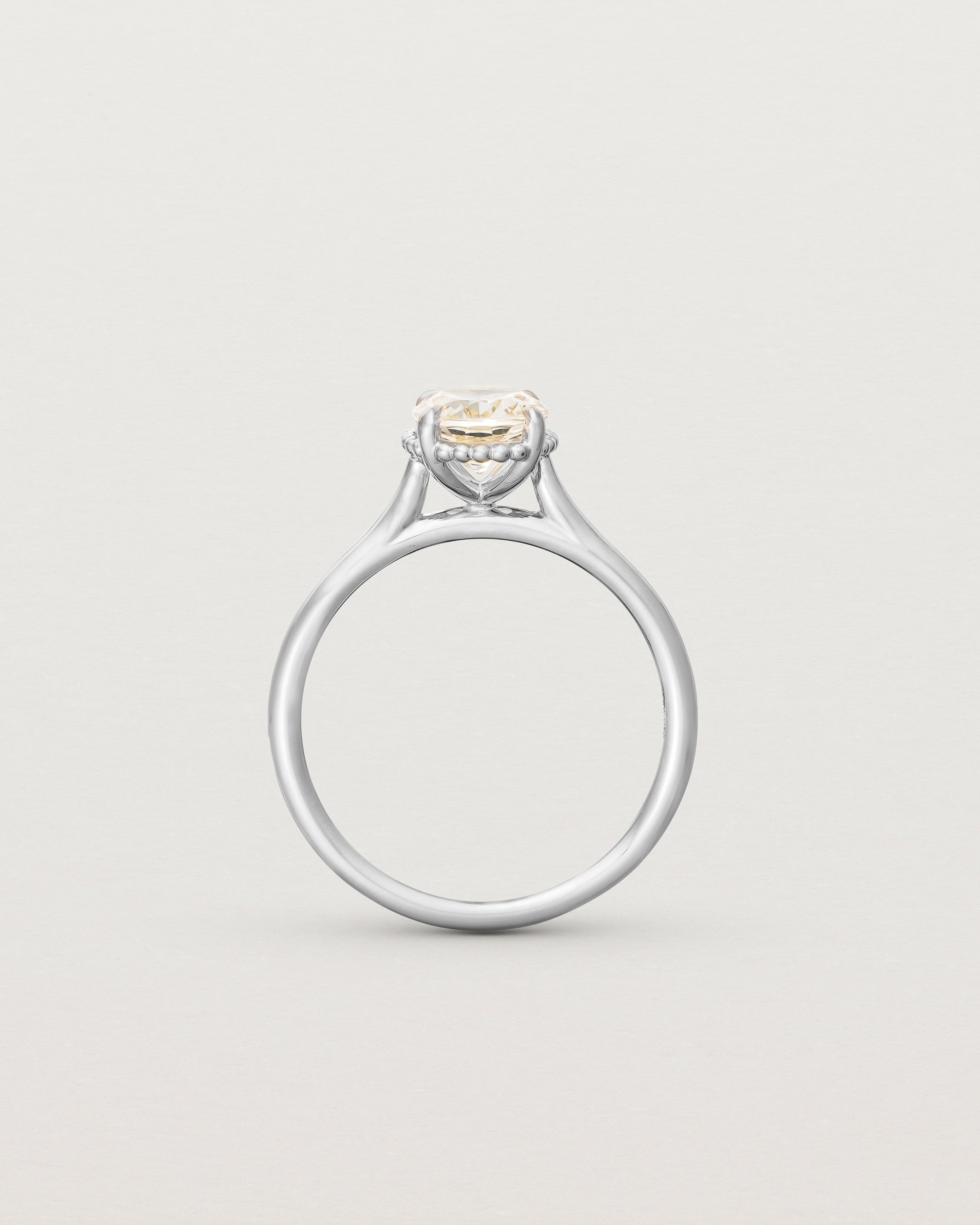 Standing view of the Thea Oval Solitaire | Savannah Sunstone in white gold.