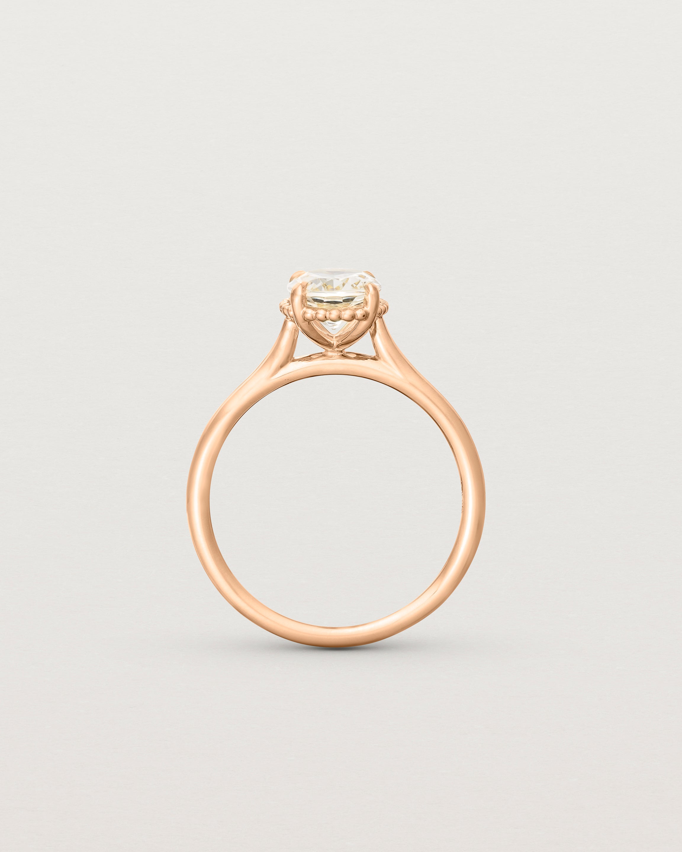 Standing view of the Thea Oval Solitaire | Savannah Sunstone in rose gold.