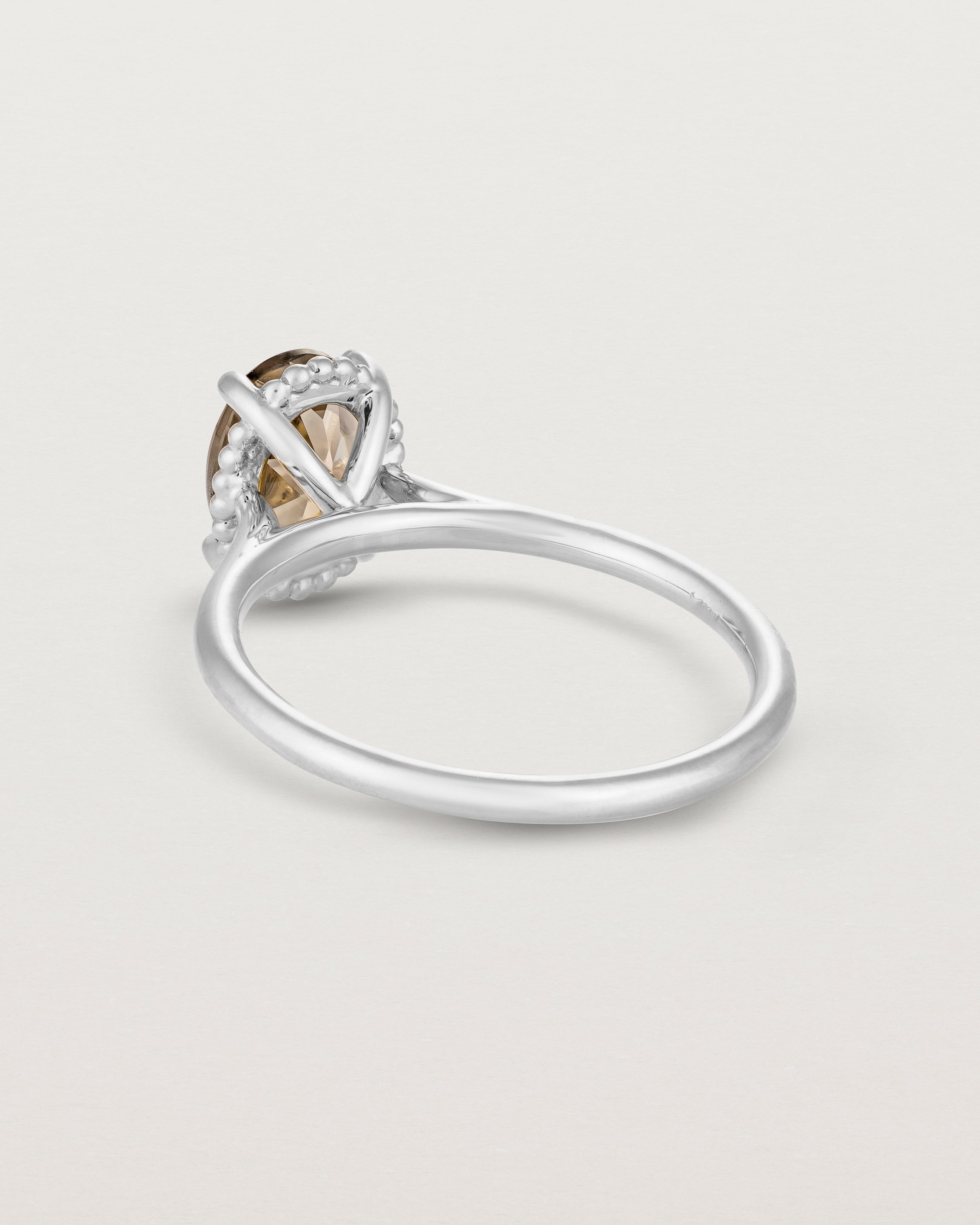 Back view of the Thea Oval Solitaire | Smokey Quartz in white gold.