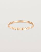Front view of the Pan Bangle in rose gold.