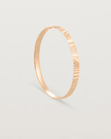 Standing view of the Pan Bangle in rose gold.