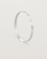 Standing view of the Pan Bangle in sterling silver.