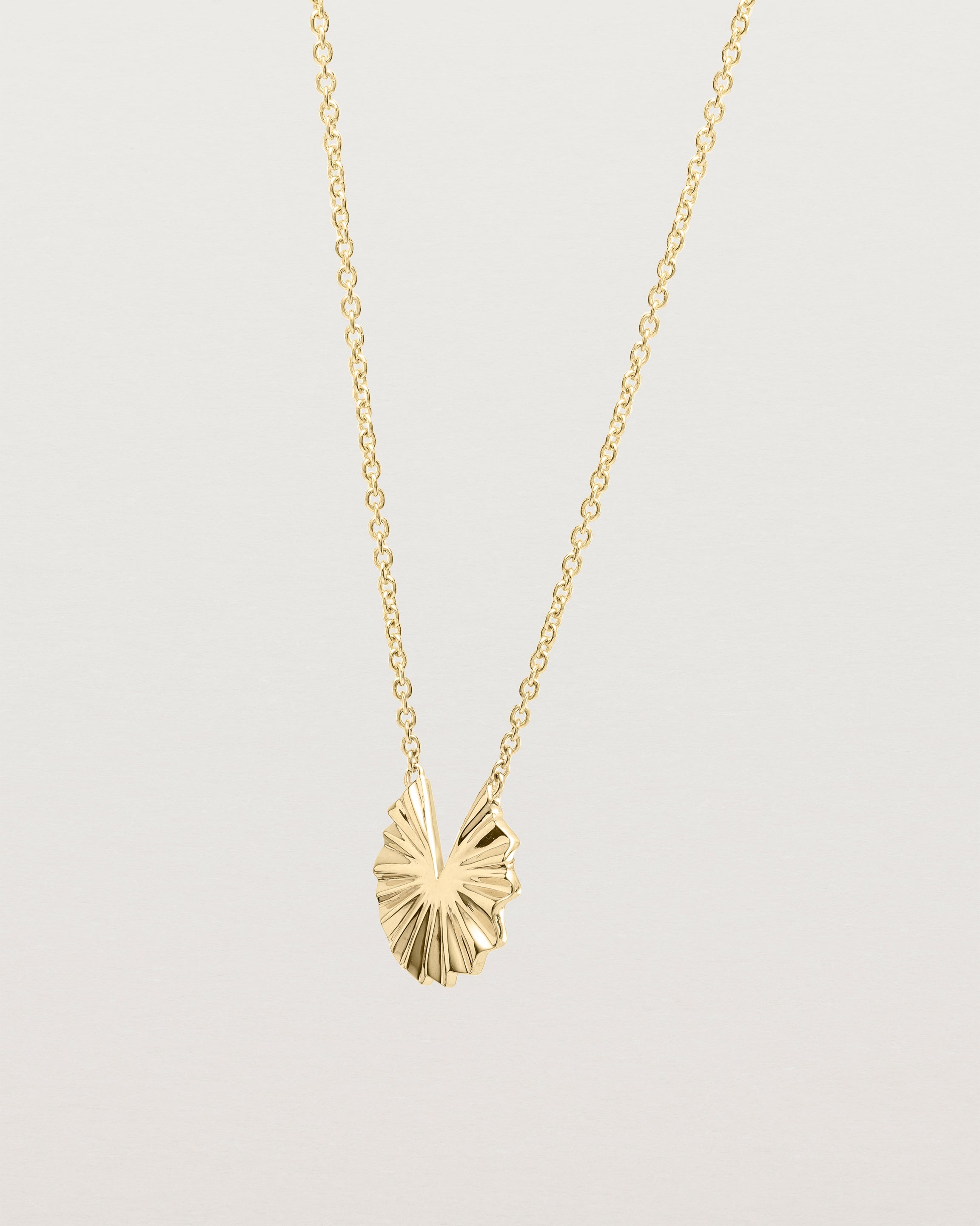 Angled view of the Pan Necklace | Yellow Gold.