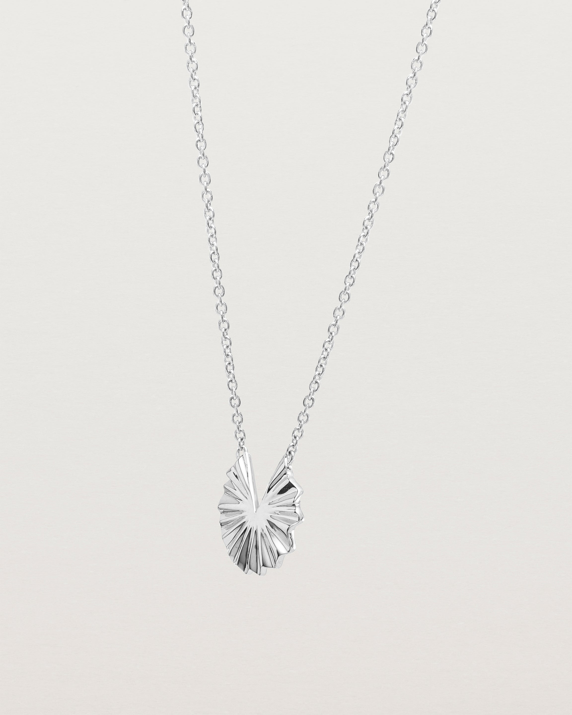 Angled view of the Pan Necklace | Sterling Silver.