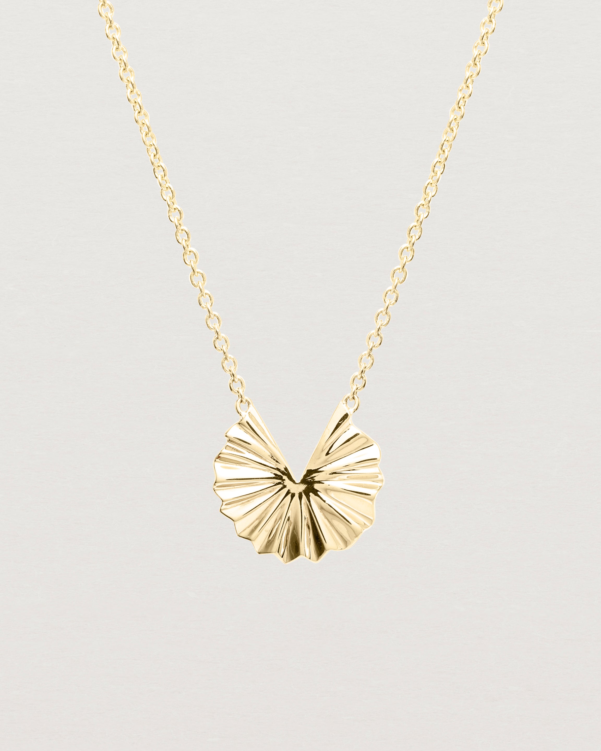 Close up view of the Pan Necklace | Yellow Gold.