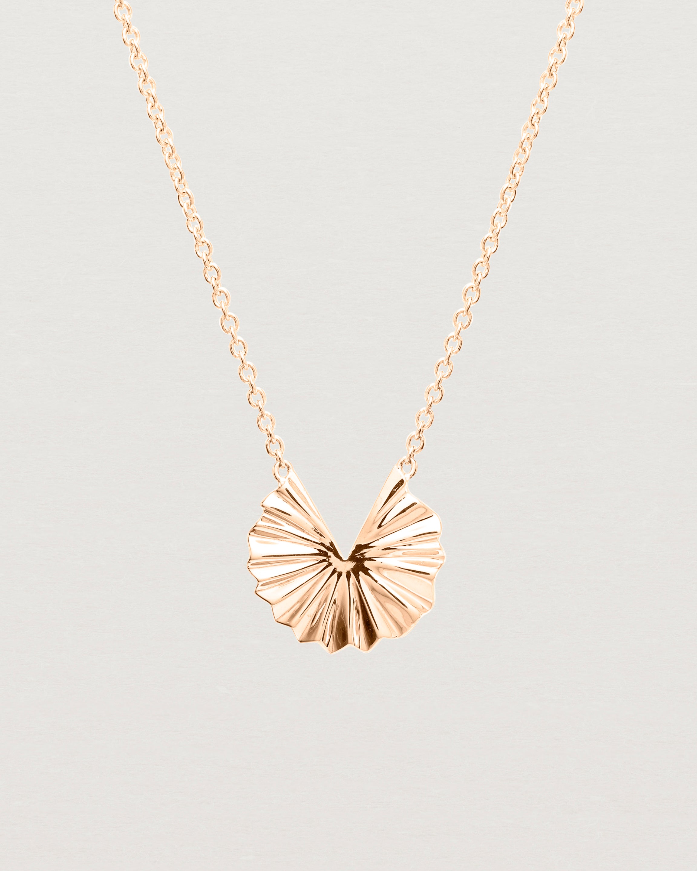Close up view of the Pan Necklace | Rose Gold.